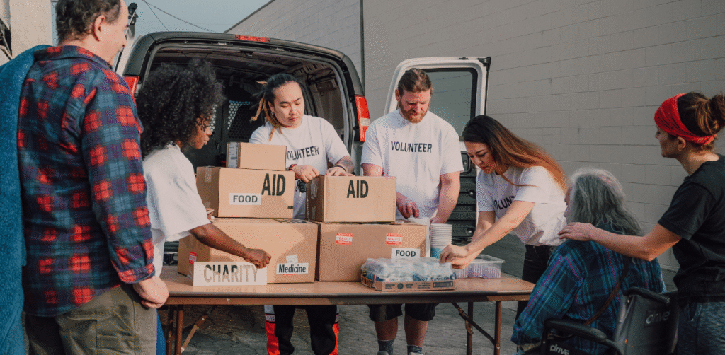 Volunteers organizing food and medicine donations for community aid